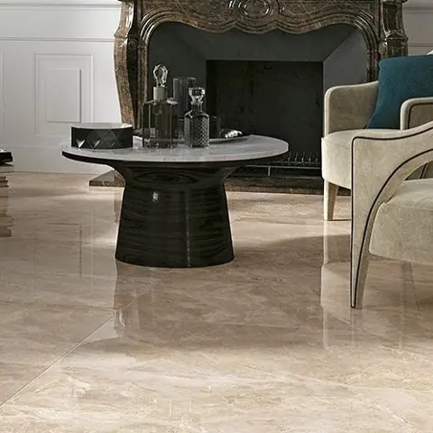 Warm beige natural stone is used for the floor throughout the room, alongside classical mouldings and decorative lighting.