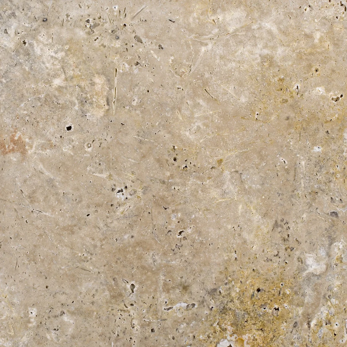 Caribbean | travertine tile Caribbean travertine tile — pale silver-grey and cream tones, a softly mottled pattern with small pale mineral flecks