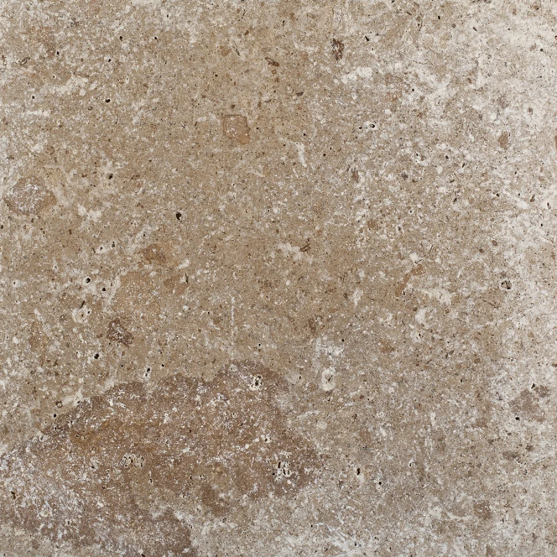 Mocha Travertine Filled And Honed | travertine tile Mocha Travertine Filled And Honed travertine tile — sandy beige and light taupe tones, a softly mottled pattern with small pale mineral flecks